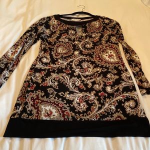 Polyester/spandex - could be a dress or shirt over leggings